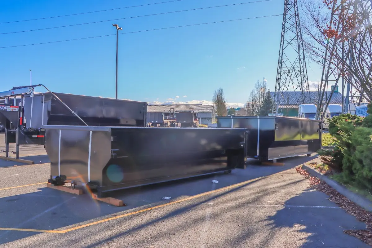 Roll-off dumpster ready for waste disposal at job site for Construction Dumpster Rental in New Britain